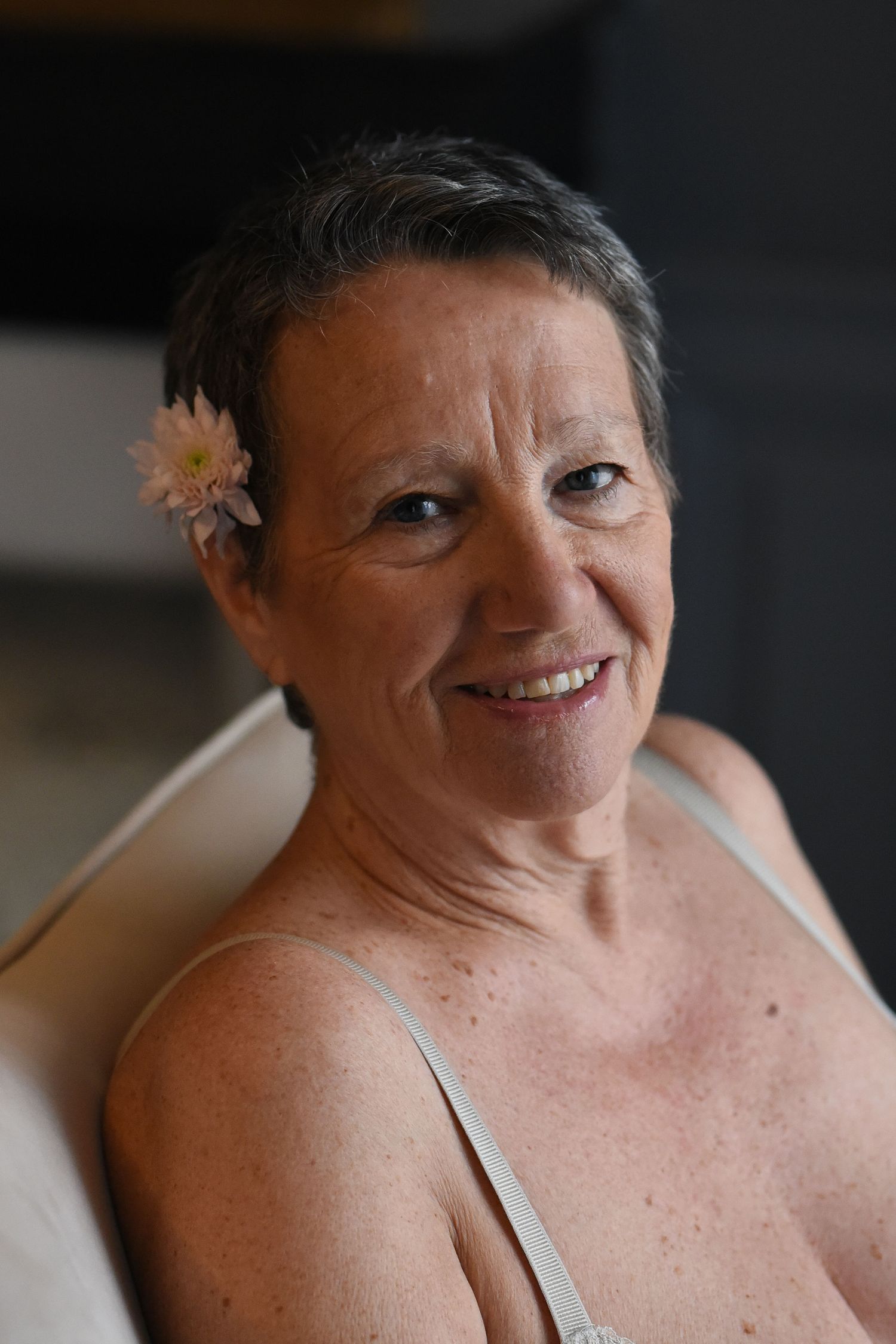 A series of close-up photos showing a person with short dark hair smiling warmly at the camera.