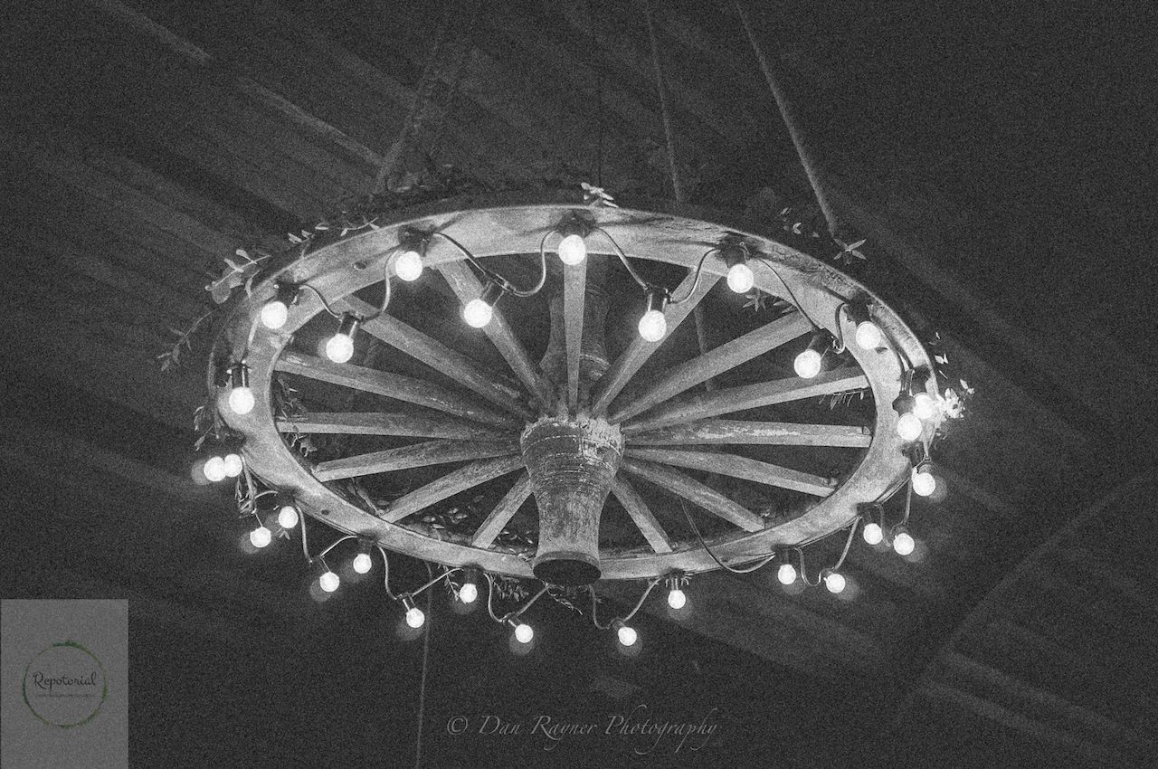 Reportage detail shot of venue wagon wheel light, soho farmhouse