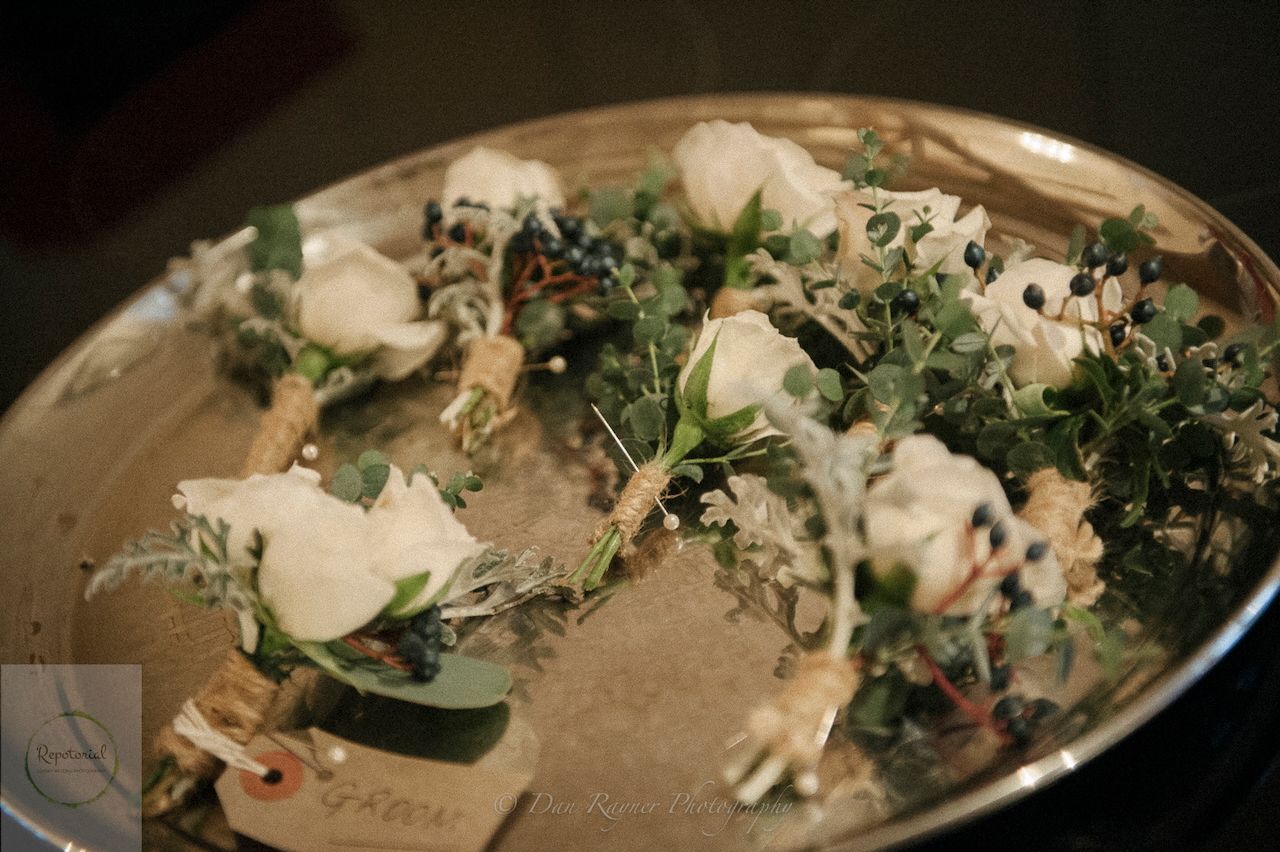 Reportage detail shot of groomsmen buttonholes