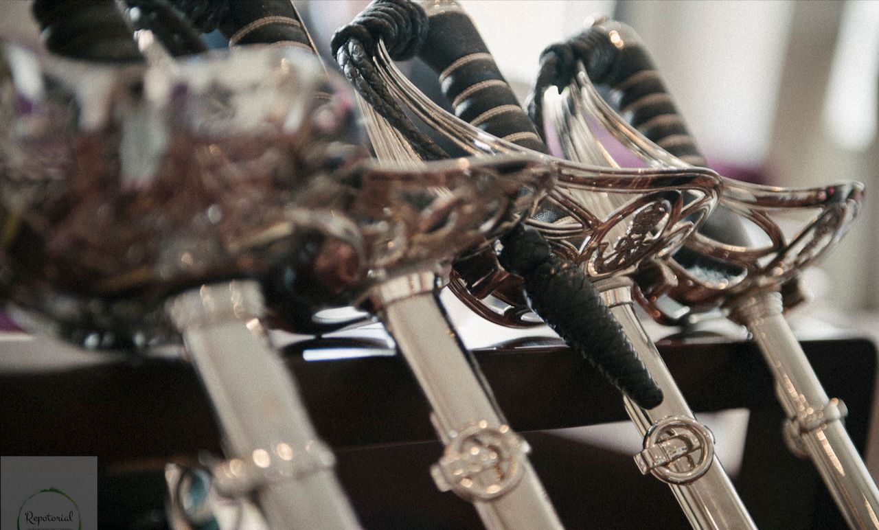 Reportage detail shot of swords for military guard of honour