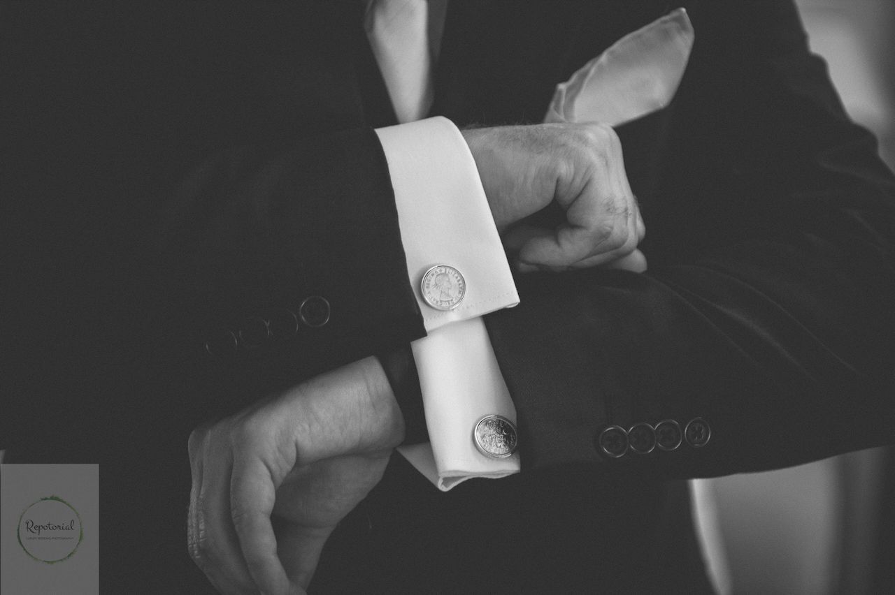 Reportage detail shot of wedding cufflinks