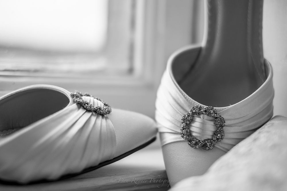 Reportage detail shot of bridal wedding shoes