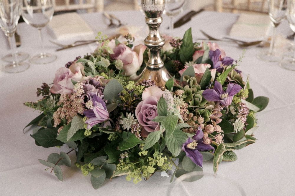 Reportage detail shot of wedding flower arrangement