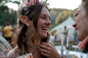 Candid moments of celebration and laughter at outdoor wedding reception.
