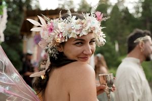 Beautiful floral crown with white and pink blooms adorned with delicate details.