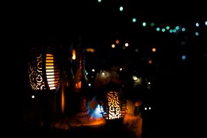 Nighttime outdoor scene with twinkling lights creating a magical atmosphere.