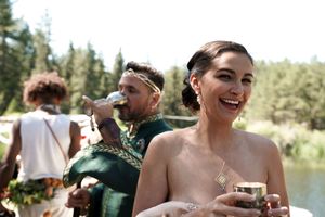 Joyful celebration moments captured during an outdoor forest wedding party.