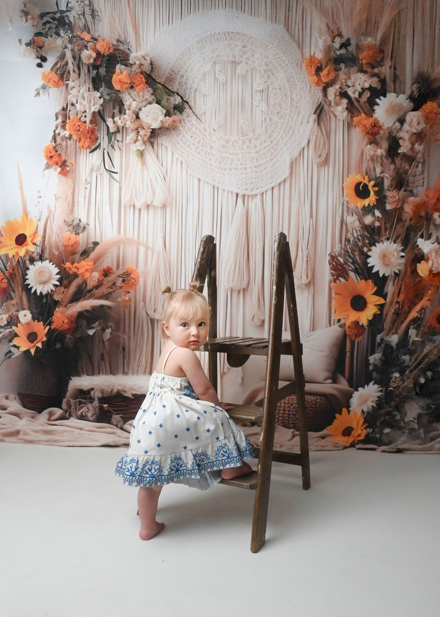 Sequence of photos with children sitting by decorative autumn backdrop with sunflowers.