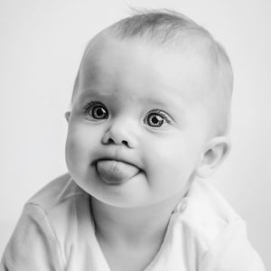 Collection of black and white close-up expressions showing pure joy and wonder.