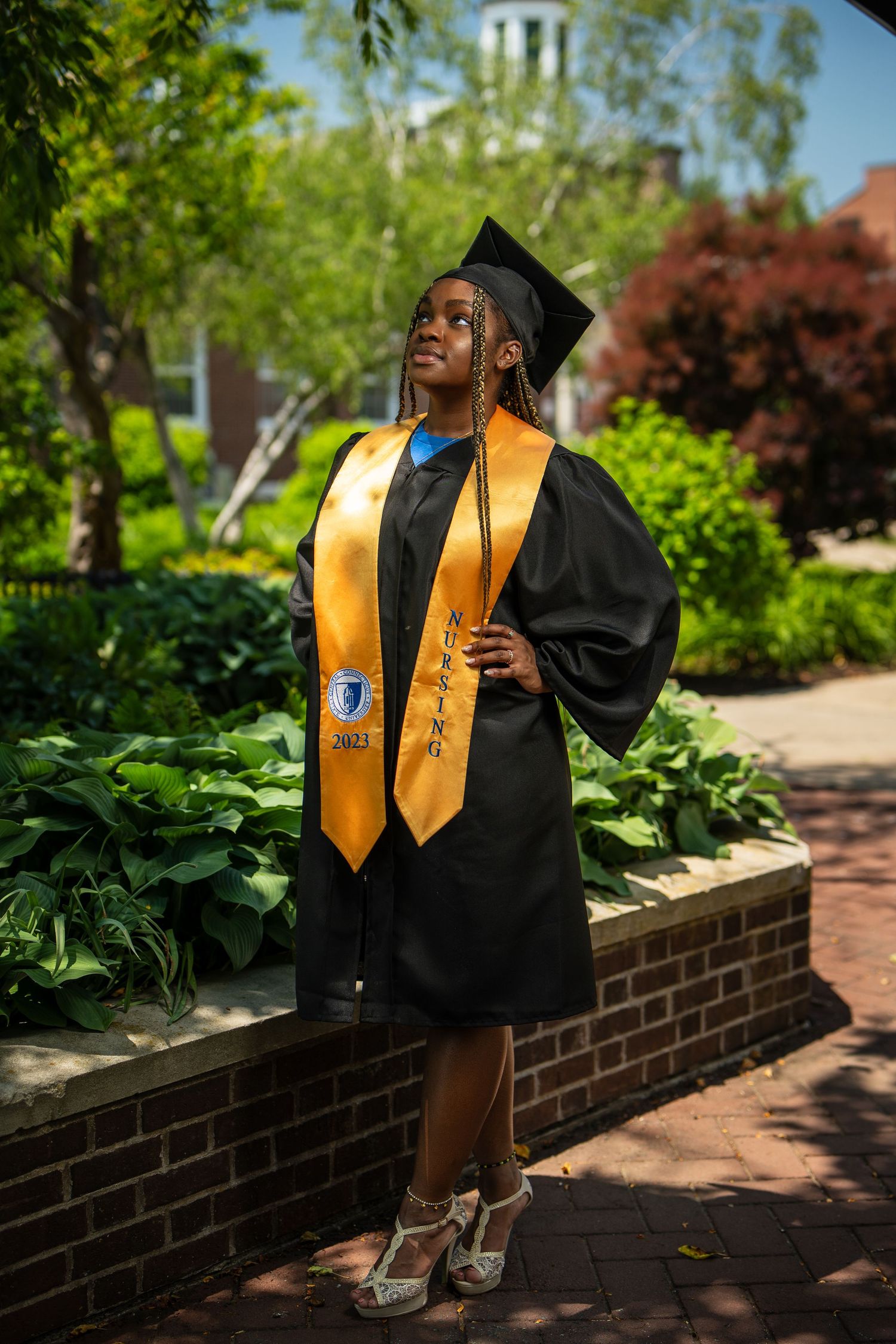 Outdoor graduation portrait — lifestyle shoot by Timoy B Photography.