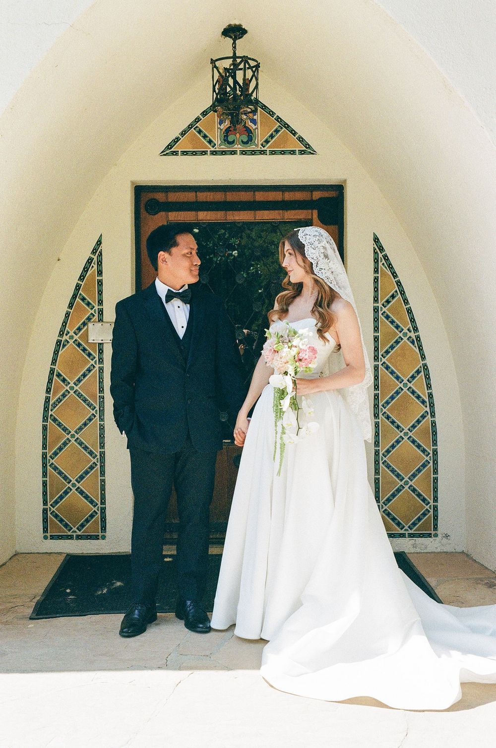 Film photography at Spanish style building in Southern California for a wedding day.