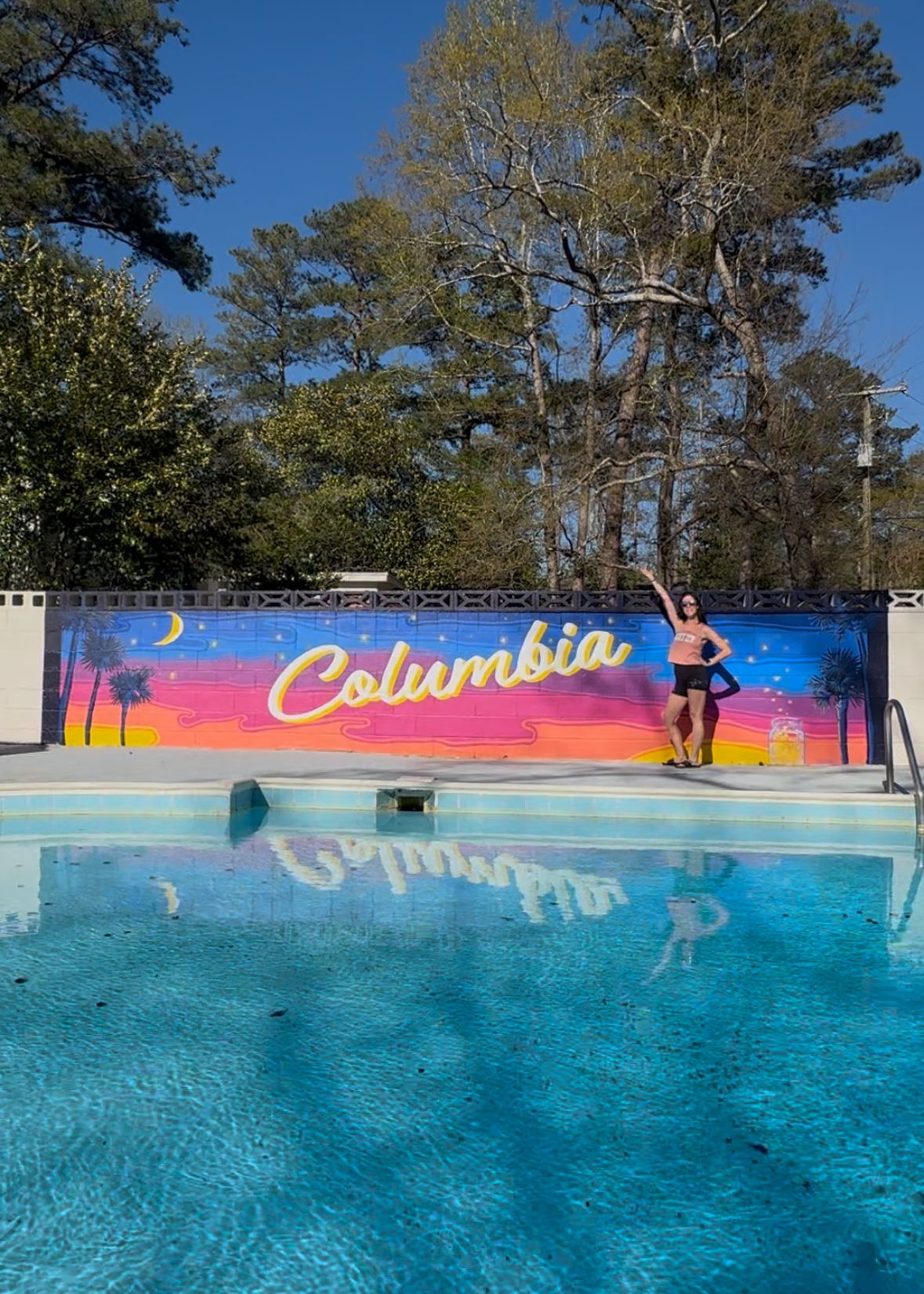 Bright and colorful pool backdrop at a STR in Columbia, SC