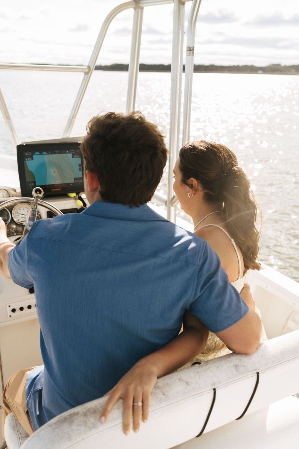 Boat Engagement session on Jekyll Island Resort in Georgia taken by Intimate wedding photographer Lemon & Honey Co.