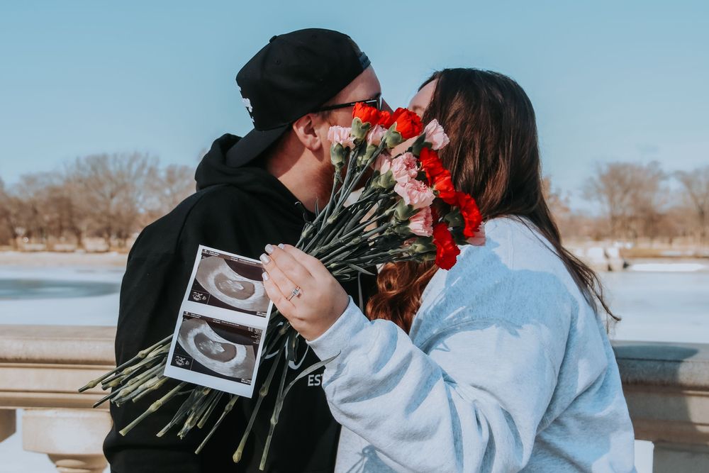 Engaged couple and pregnancy announcement