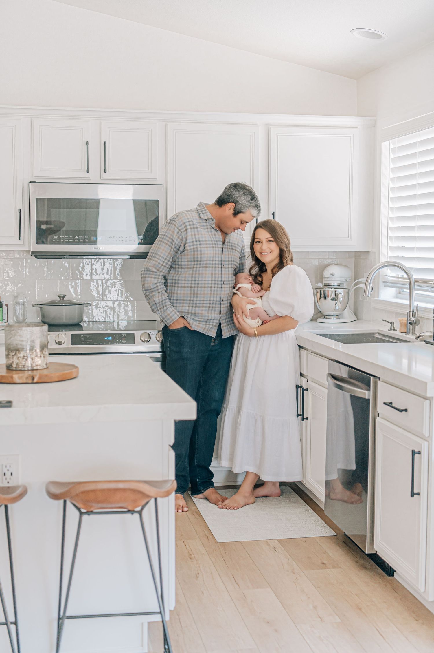 North West Newborn Family Photographer In Home Session baby mom dad