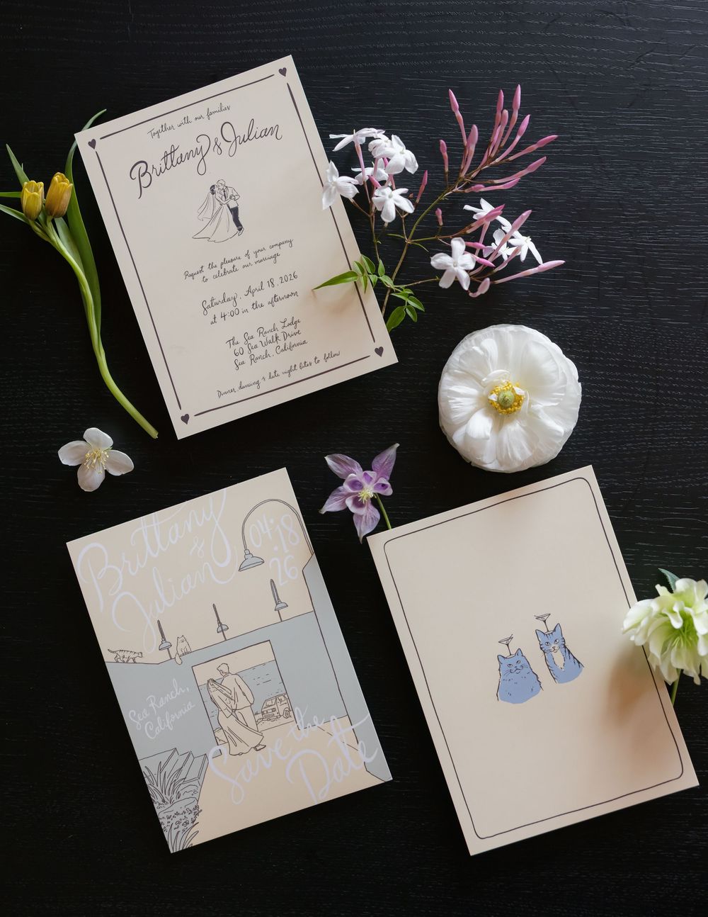Elegant wedding invitation suite with floral accents, featuring illustrated cards on a dark background with purple and white flowers.