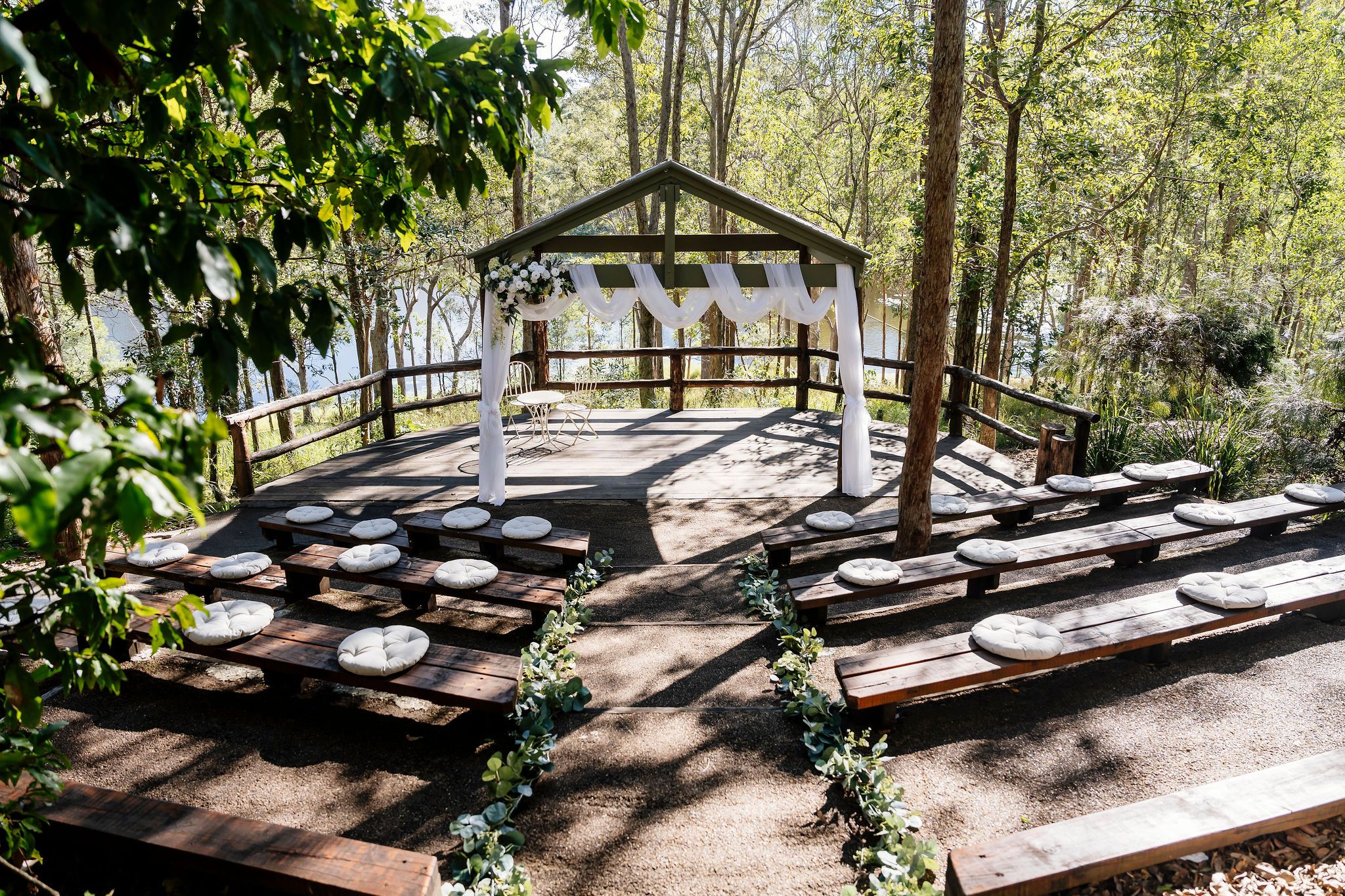 Rustic, lakeside outdoor ceremony at Walkabout Creek, wedding venue