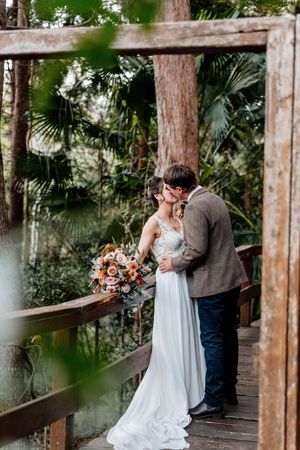 Romantic outdoor Wedding portrait at Walkabout Creek, Brisbane rainforest wedding venue