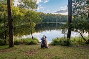Lakeside Wedding portrait at Walkabout Creek, Brisbane rainforest wedding venue