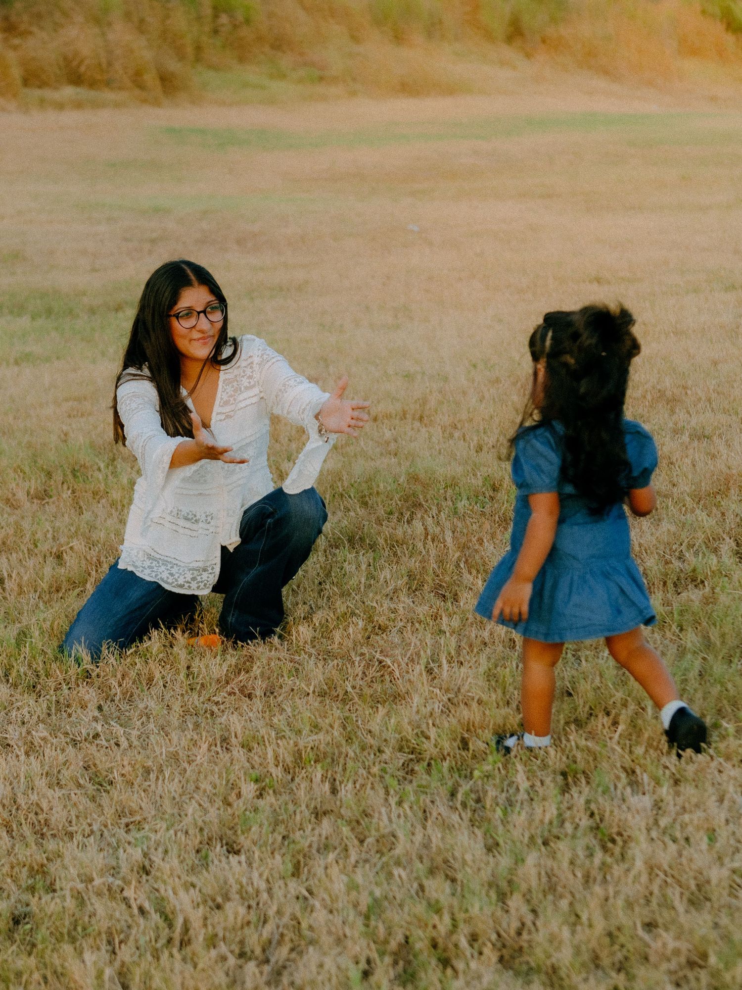 Daughter running to mom at barkley meadows park