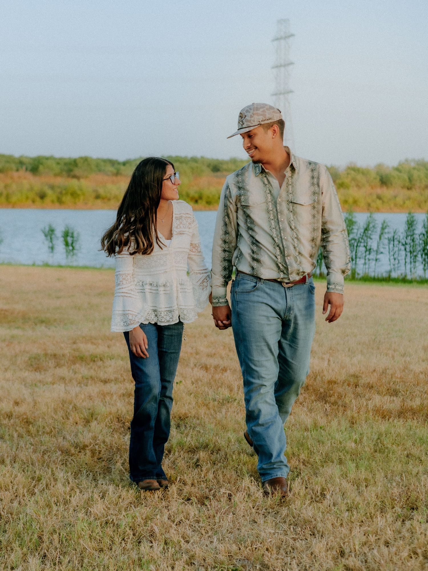 couple walking at barkley meadows park