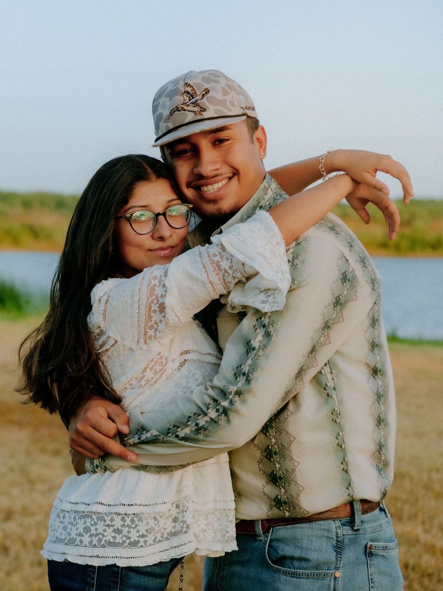 couple hugging at barkley meadows park
