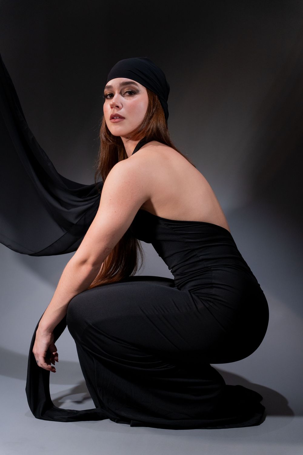 Creative editorial studio portrait with dramatic lighting in Miami. By OKataStudio