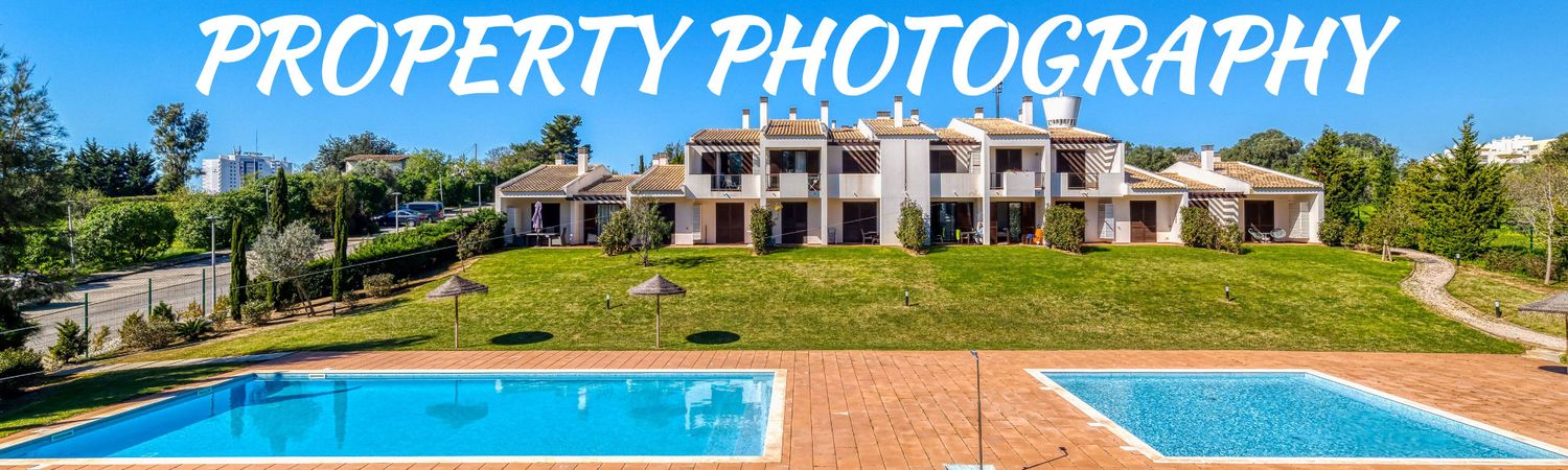 Luxury residential property with a large swimming pool and lush green gardens in a sunny location. Property photography by Dave Sheldrake.