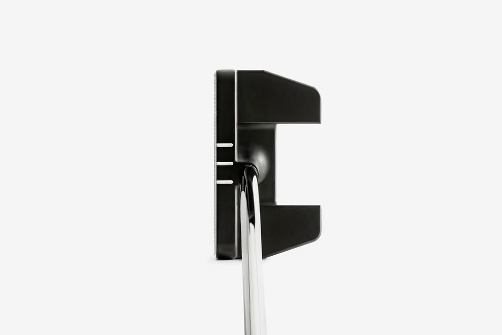 Black mallet golf putter with alignment lines, face-on view, featuring a modern square head design on white background.