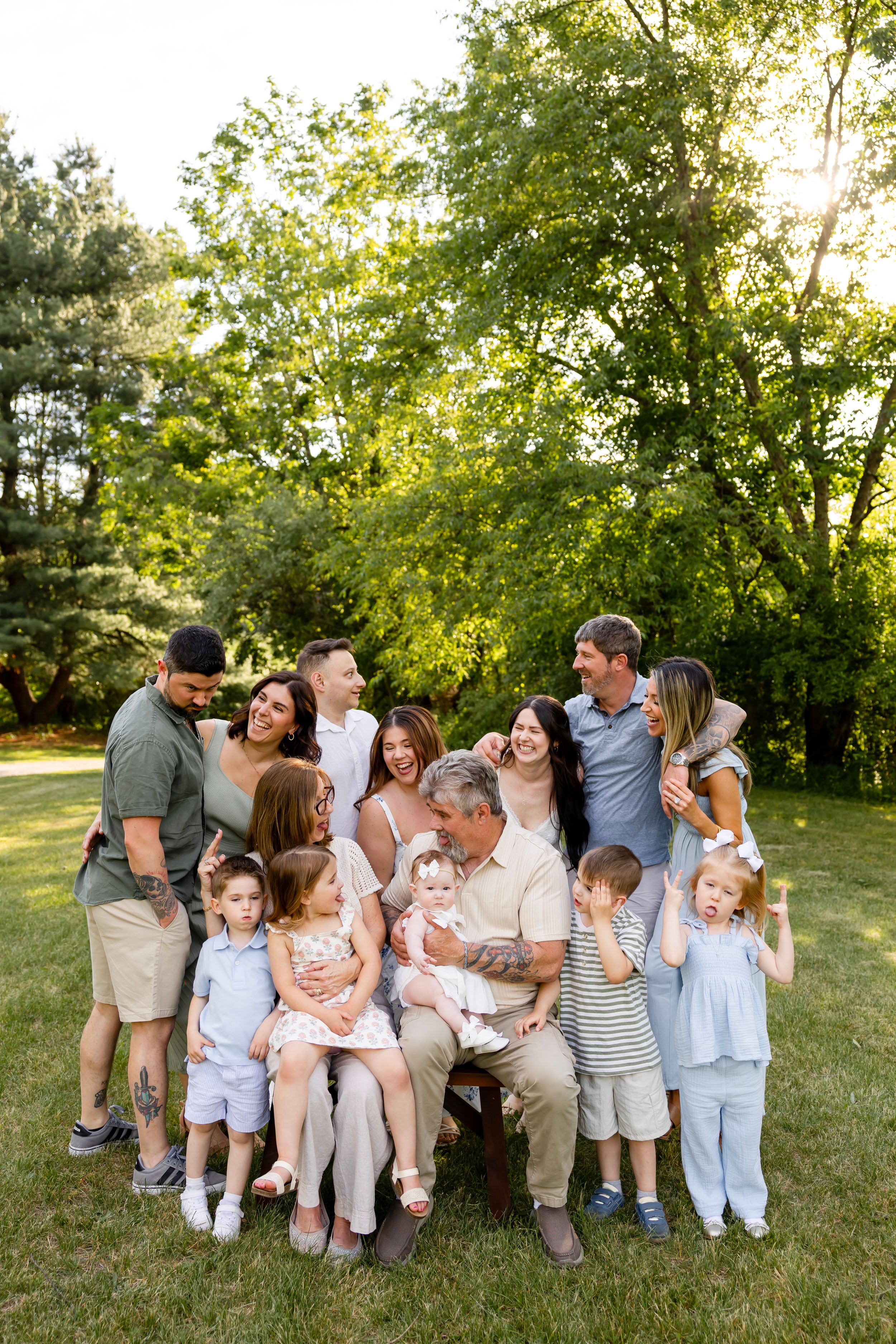 Extended family photography session in Newton, NJ capturing grandparents, children, and grandchildren together.