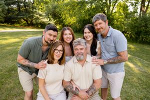 Extended family photography session in Newton, NJ capturing grandparents, children, and grandchildren together.