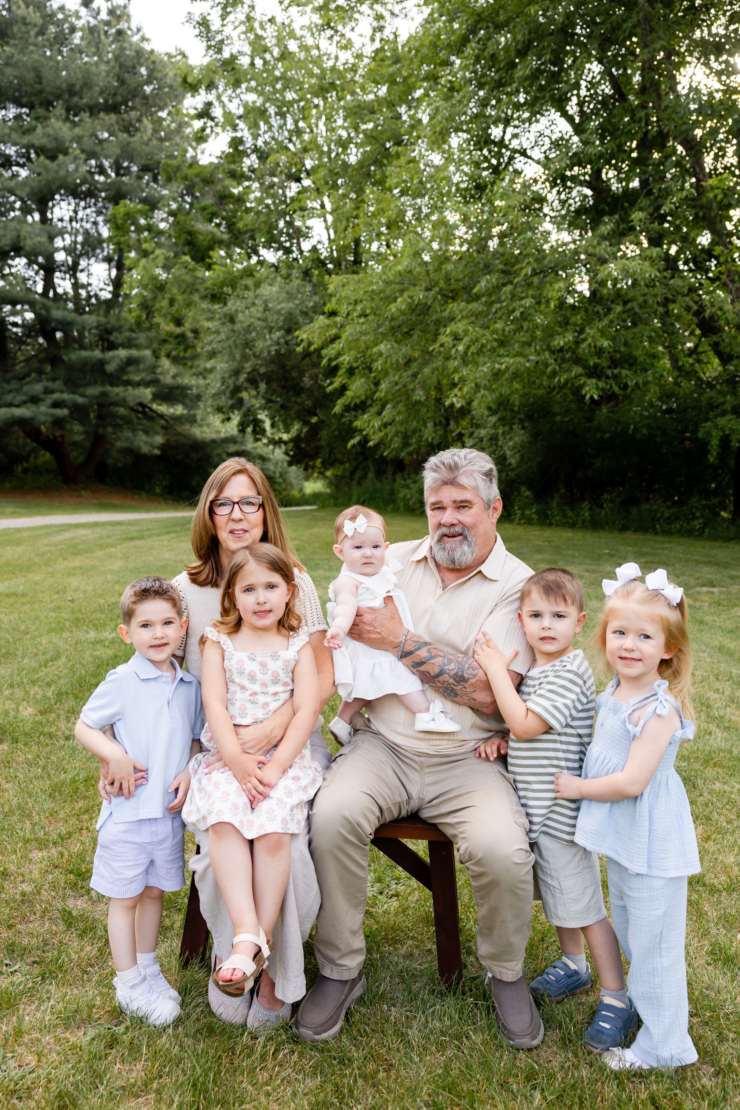 Outdoor extended family session in Sussex County, NJ with grandparents, parents, and grandchildren.