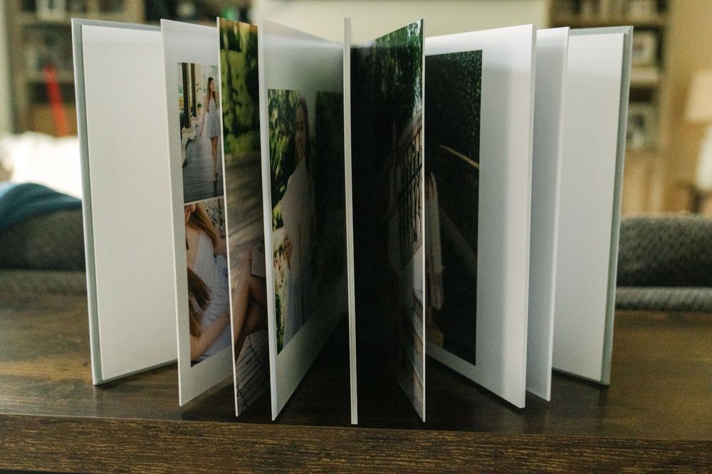 Handcrafted senior portrait album showcasing Gabi's Sea Island, Georgia graduation photos.