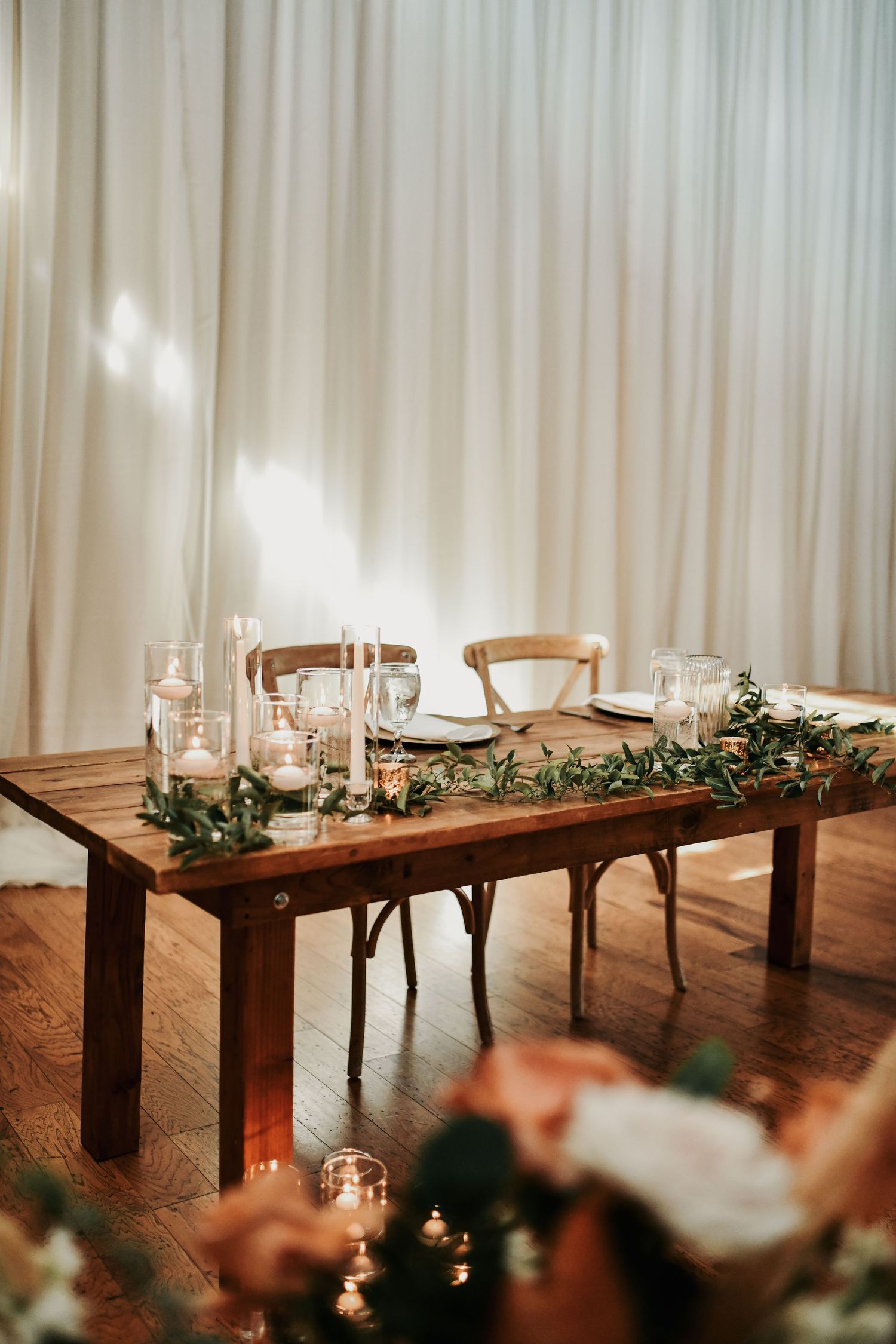 Gold wedding decor adding warmth to a rustic Texas ranch reception