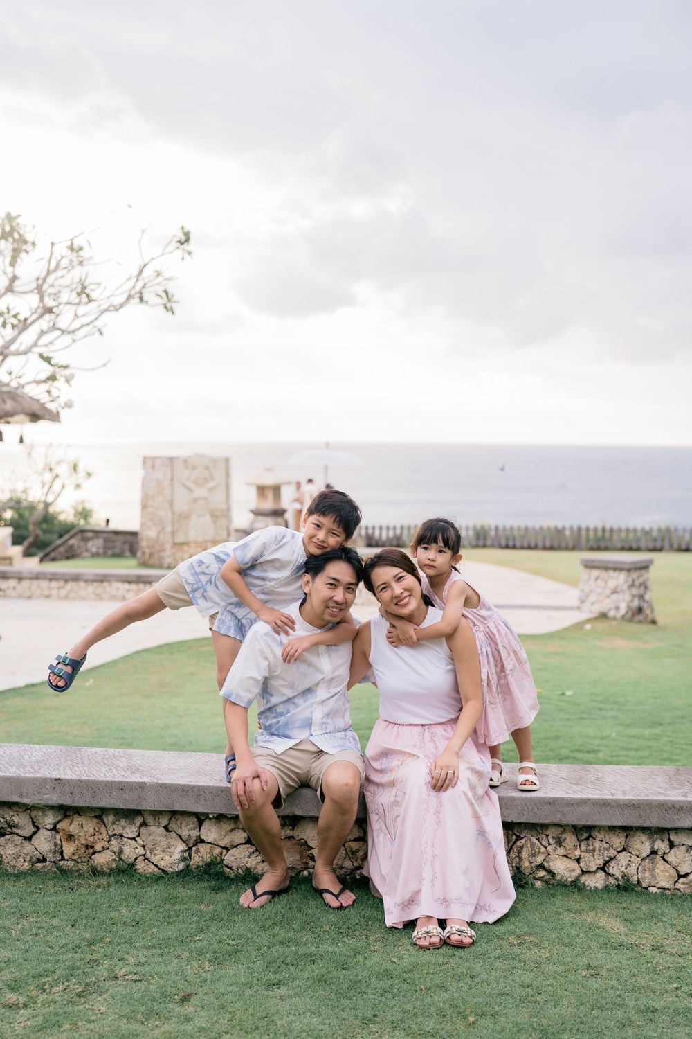 Natural family portraits captured at AYANA Resort Bali.
