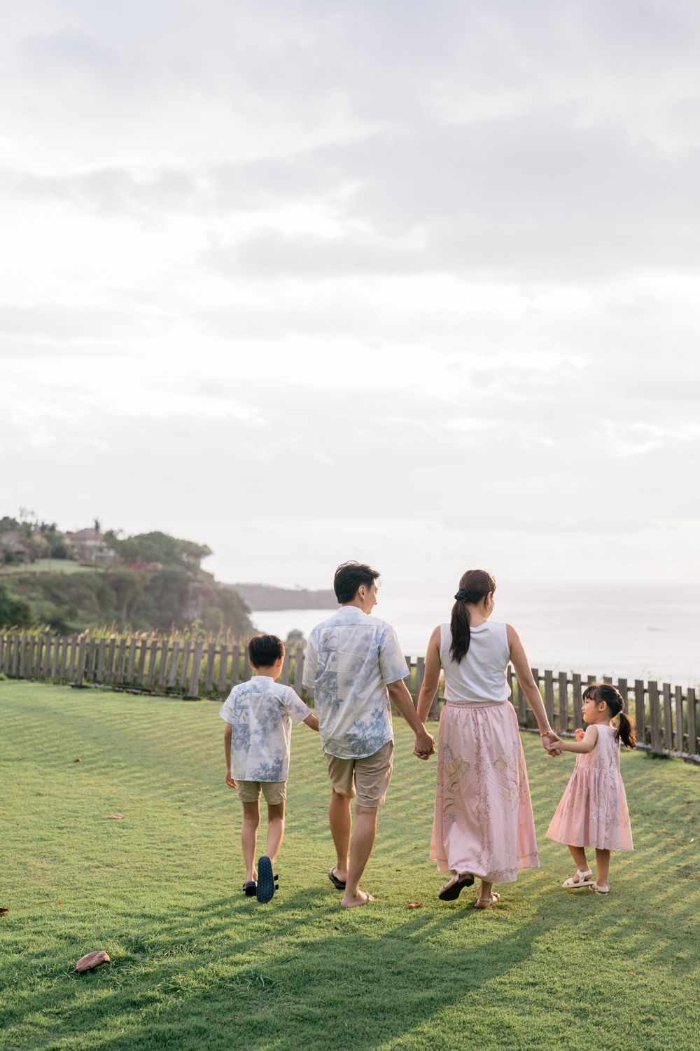 Natural family portraits captured at AYANA Resort Bali.