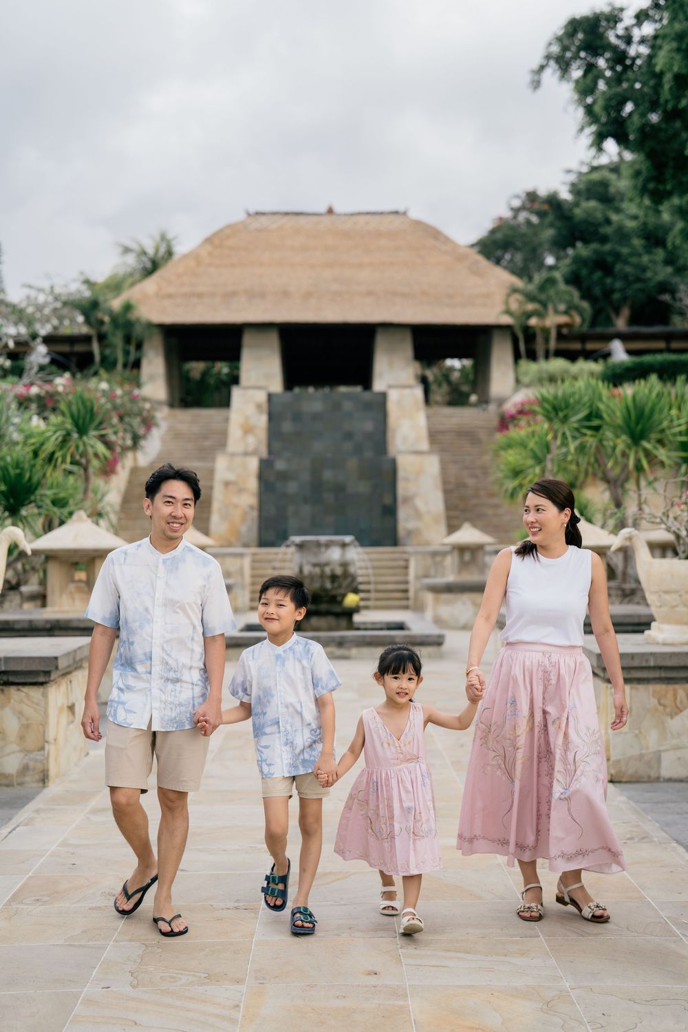 Natural family portraits captured at AYANA Resort Bali.