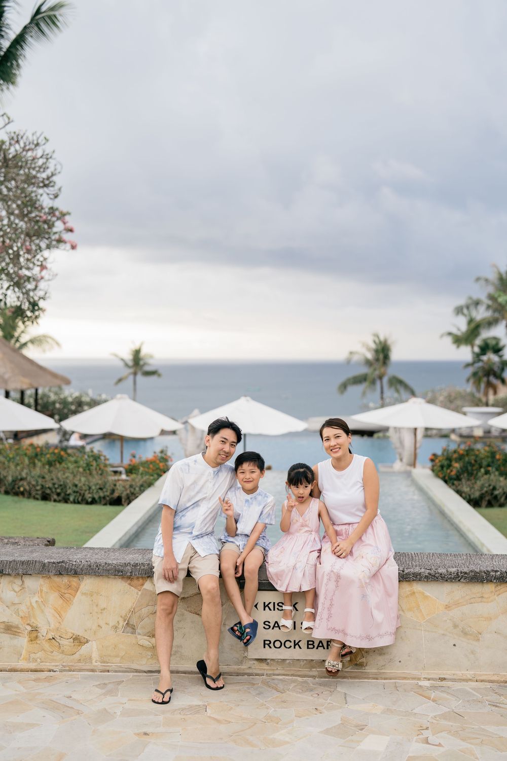 Natural family portraits captured at AYANA Resort Bali.