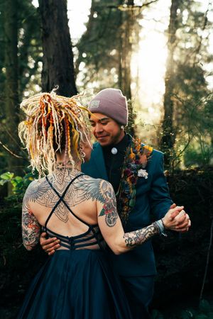 Cinematic moment of a couple sharing an intimate moment at Deception Pass, WA during an engagement session, Captured by Savvy Photography.