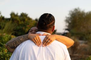 Couple engagement session at Golden Gardens, Seattle, at golden hour, Captured by Savvy Photography