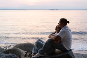 Couple engagement session at Golden Gardens, Seattle, at sunset, Captured by Savvy Photography