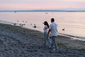 Couple engagement session at Golden Gardens, Seattle, at sunset, Captured by Savvy Photography