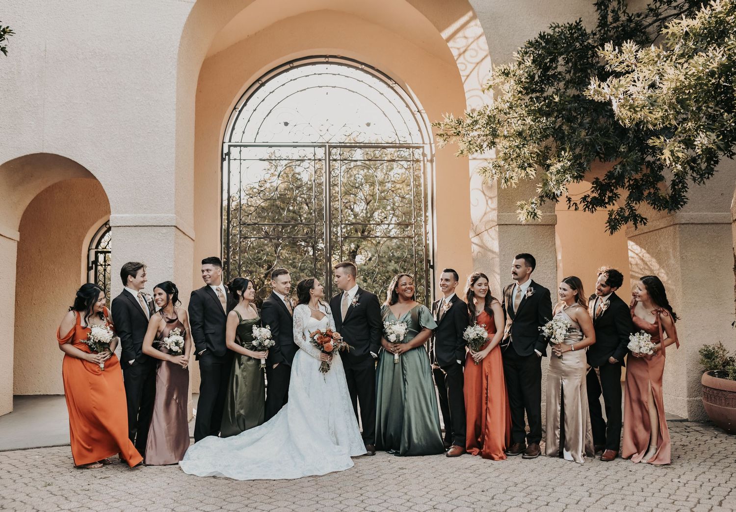 Bride and groom formal portraits after Catholic wedding in Coppell