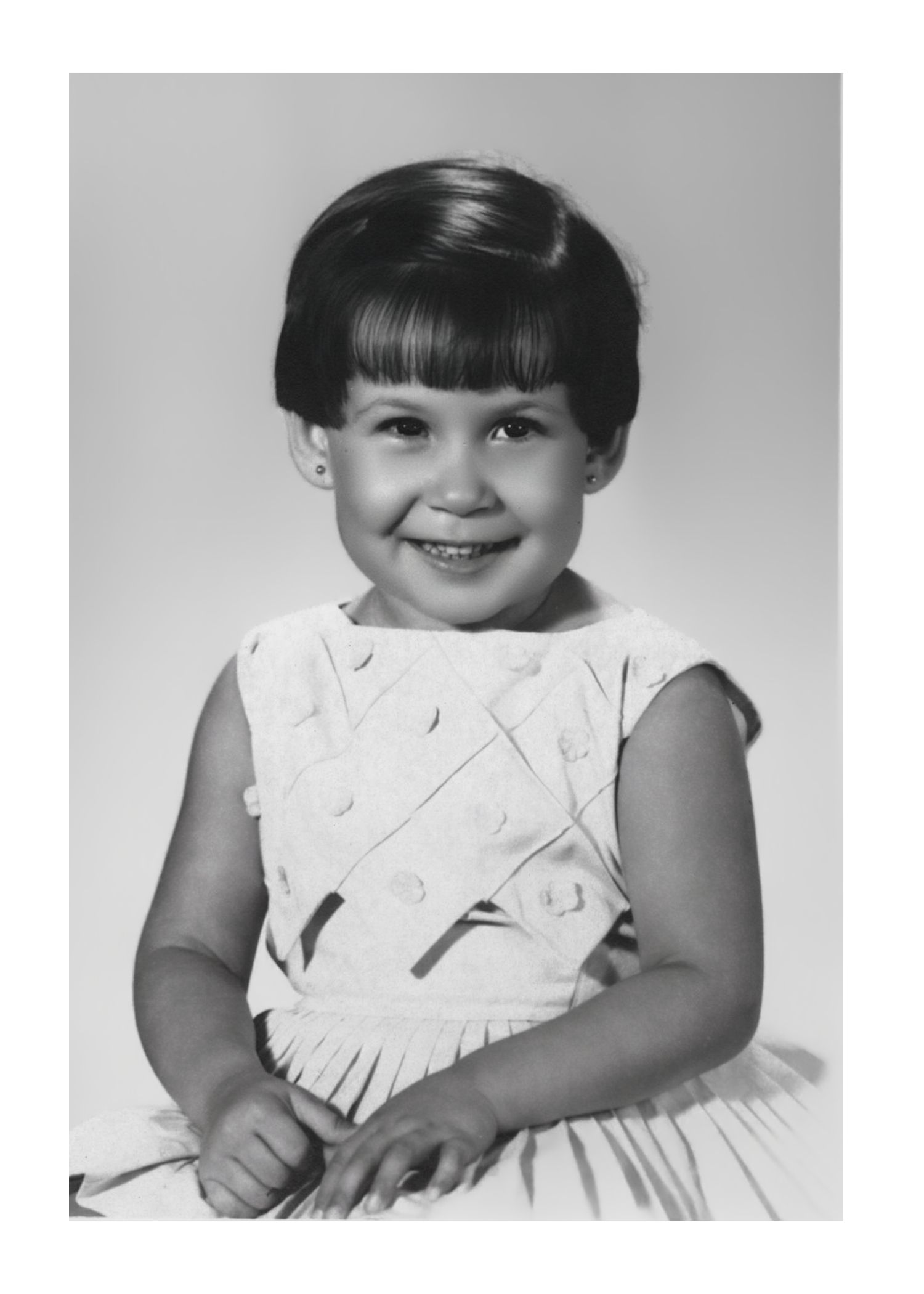Restored vintage photo of Odette's aunt as a child in Cuba, 1967, restored by Odette Photo+Art as a personal photo restoration project