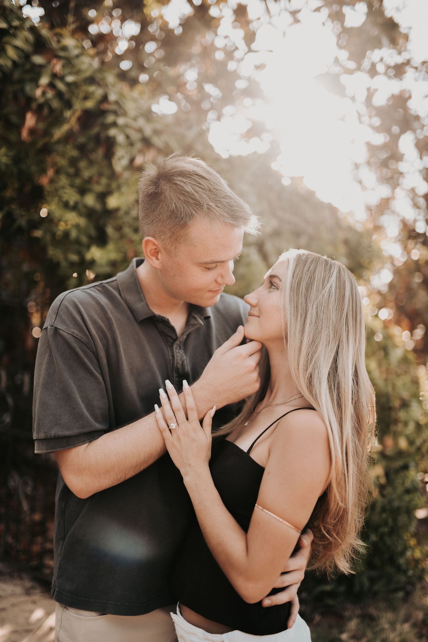Intimate outdoor proposal surrounded by lush greenery in Denton