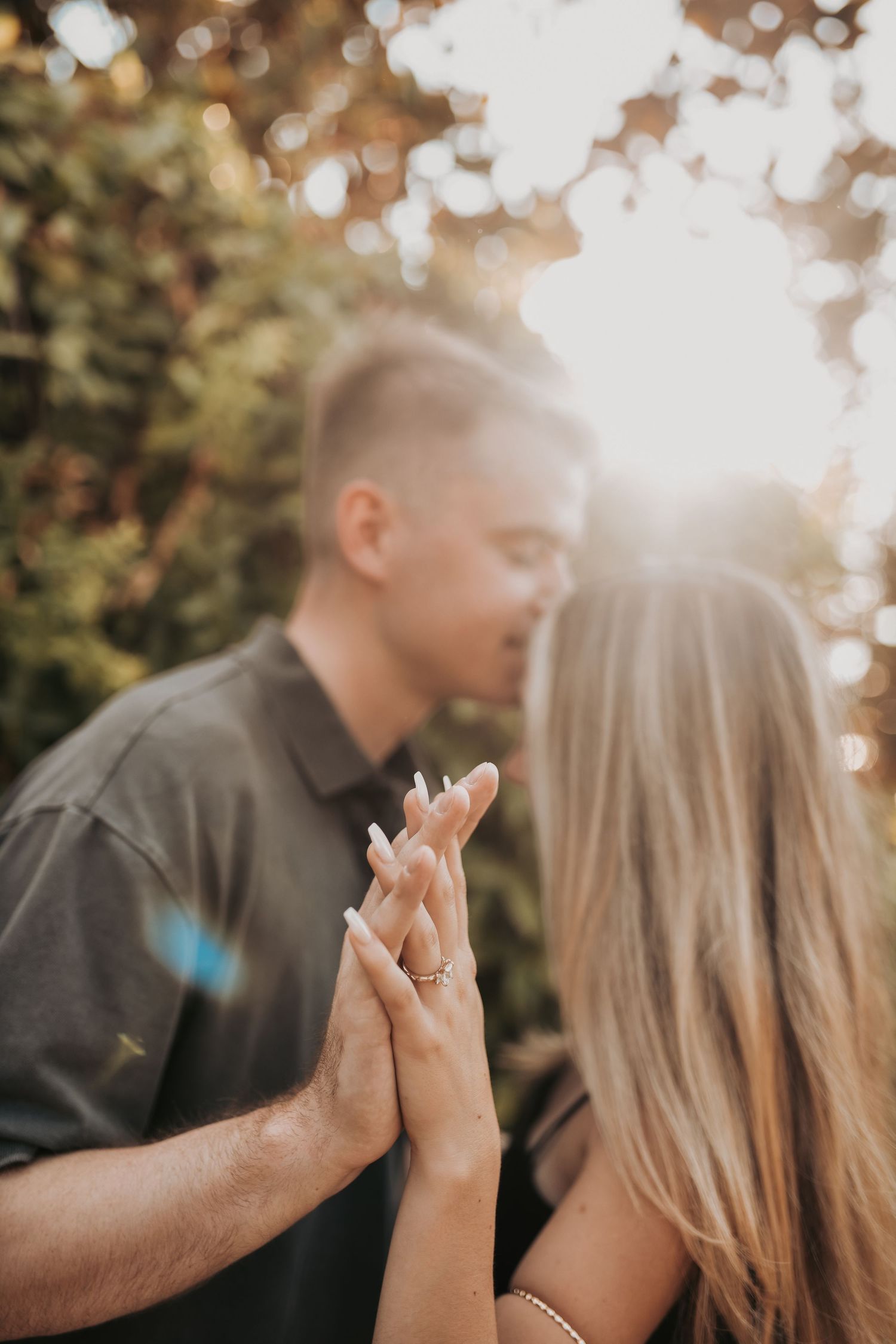 Newly engaged couple moments after their surprise proposal