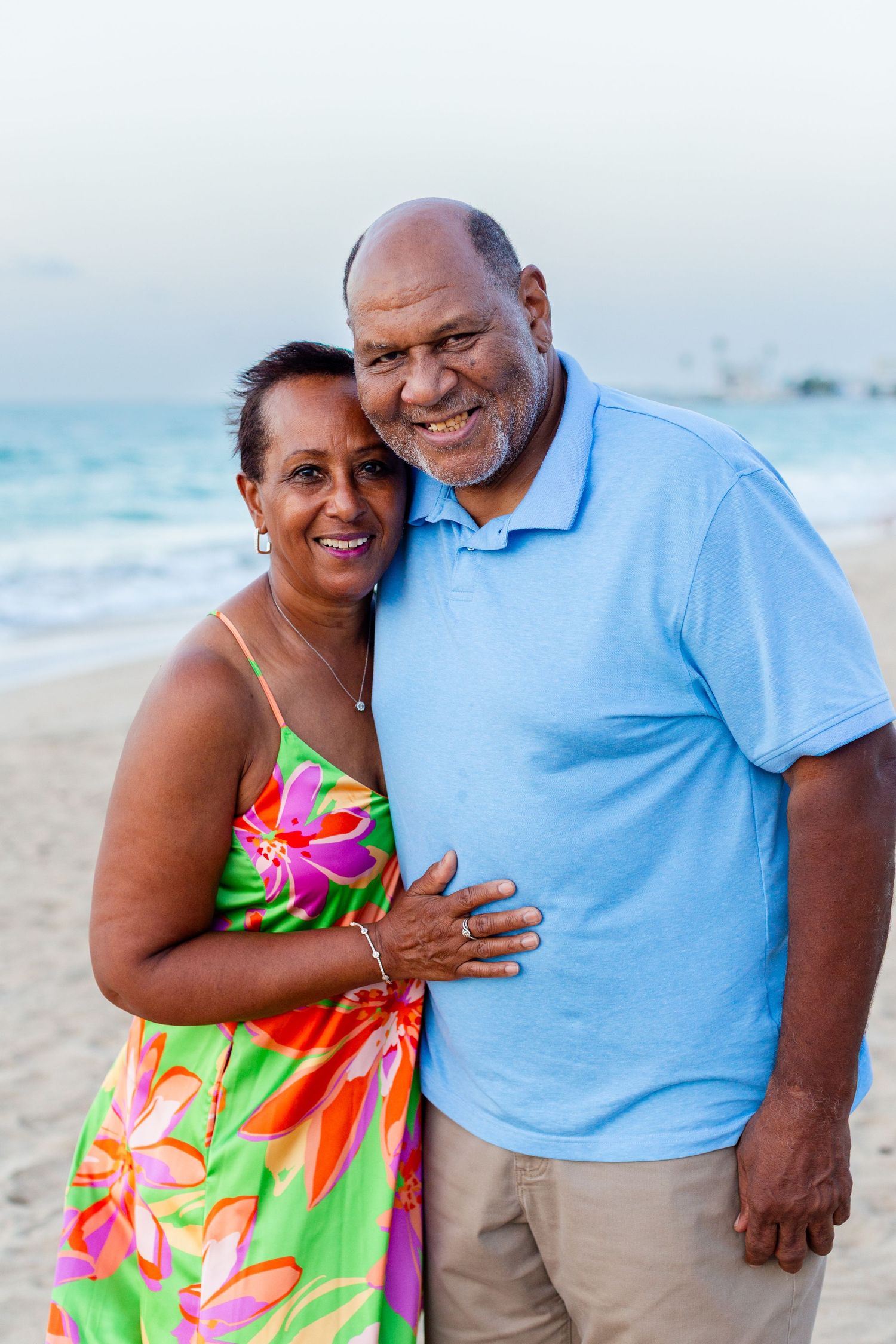 Couples portrait on the beach in Isla Verde, Carolina, Puerto Rico.