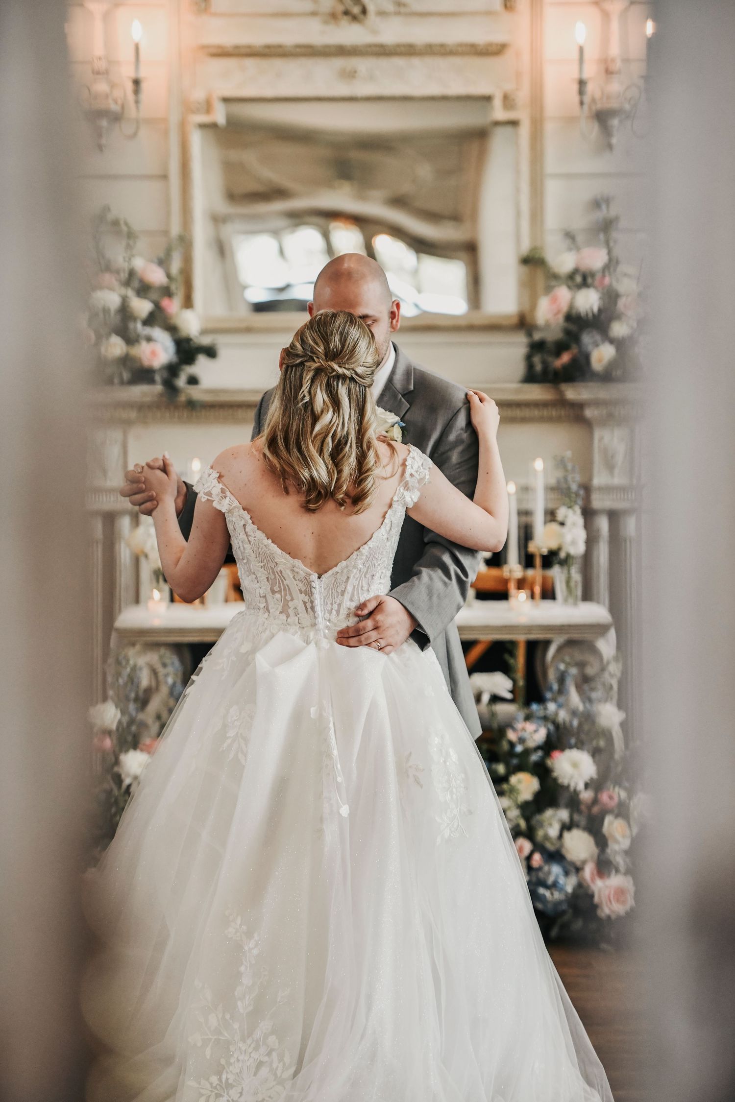 Candid bride and groom first dance photographed at The French Farmhouse