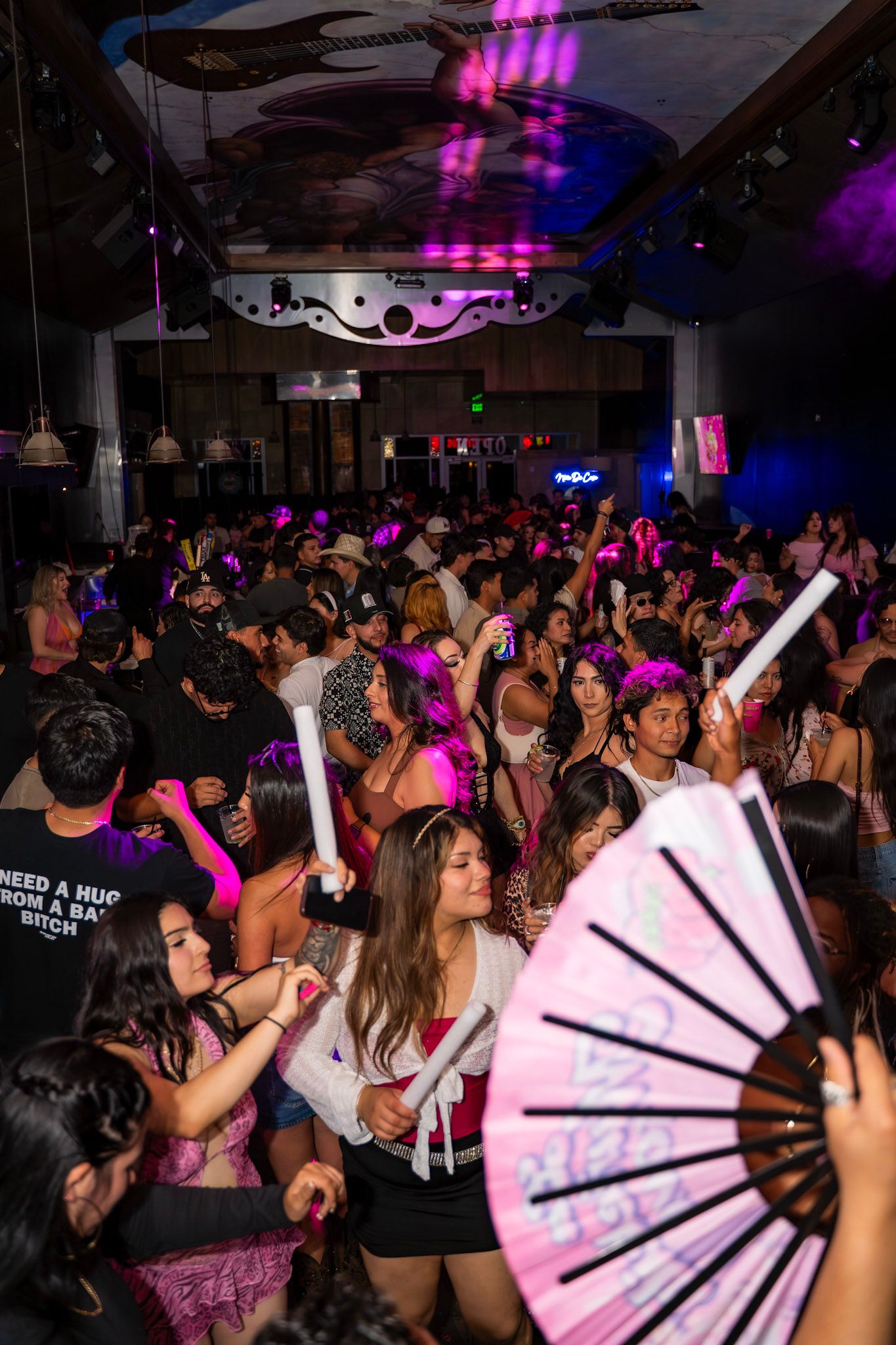 Crowd enjoying a packed nightclub event photographed by Bercuflix.
