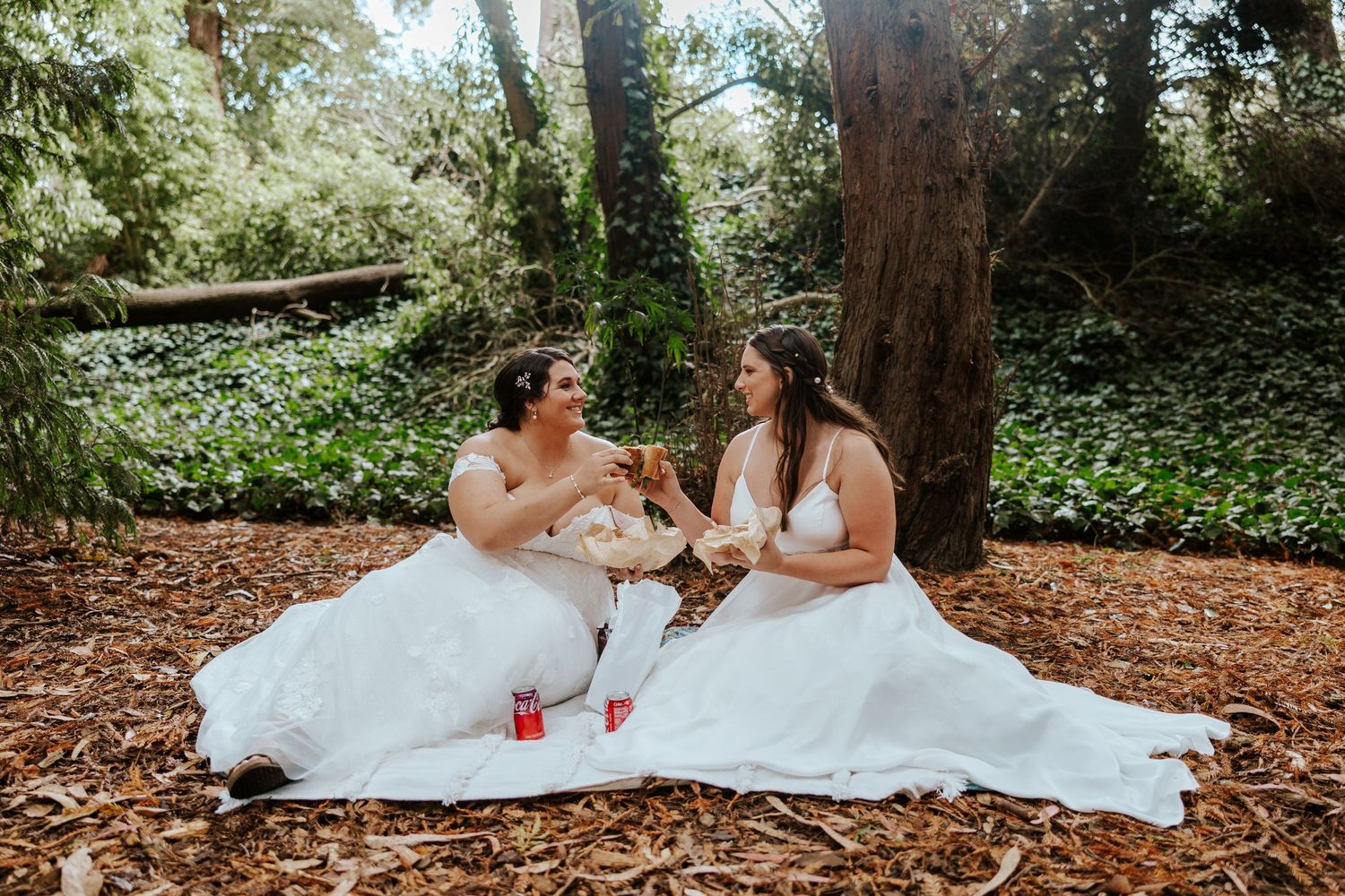 brides picnicking in redwood grove in golden gate park during san francisco elopement day